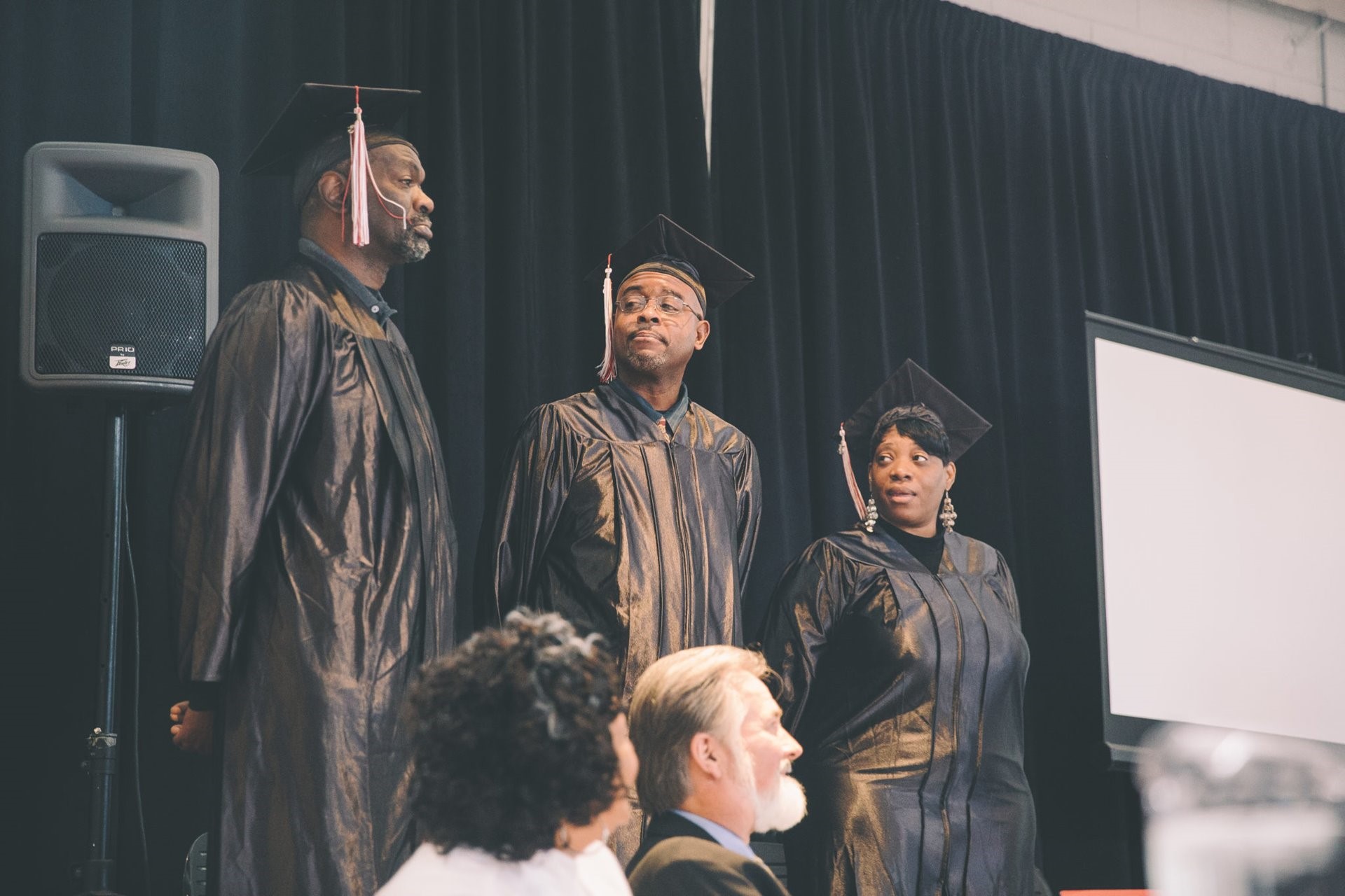 A recent class of Transformation Program graduates are recognized at the Harvest Center.