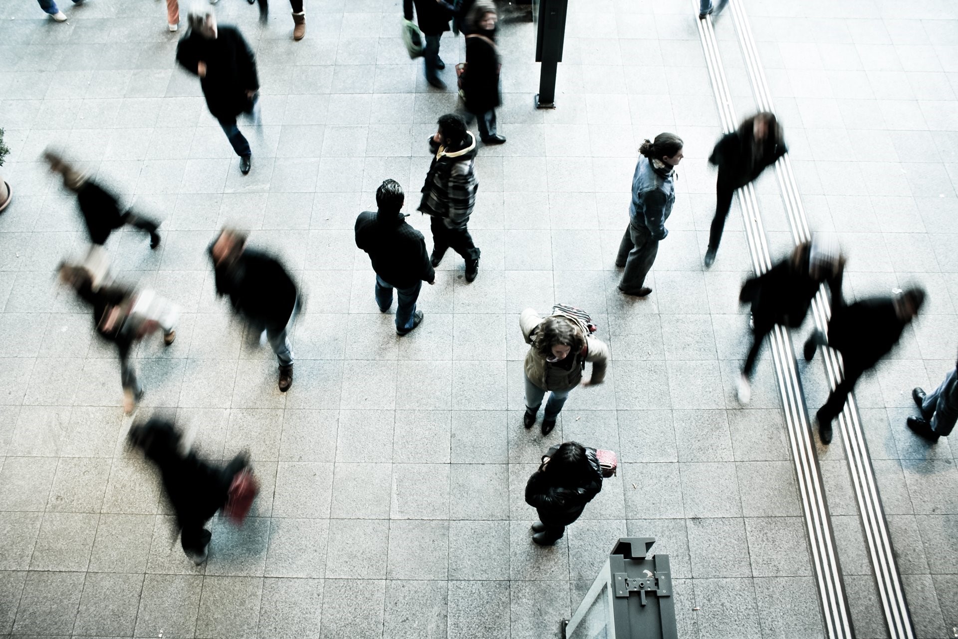 busy floor, blurred people walking