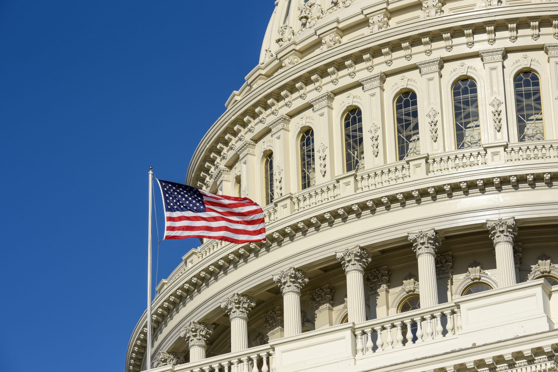 US Congress - Capitol building at Capitol Hill in Washington DC- sunny spring day and clear blue sky