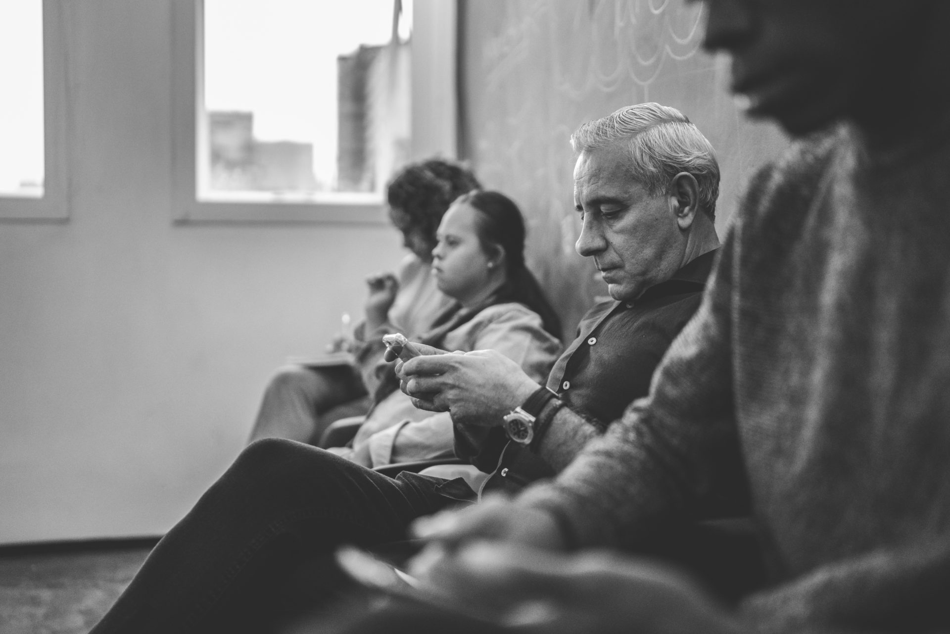 Group of people waiting for job interview including a special person