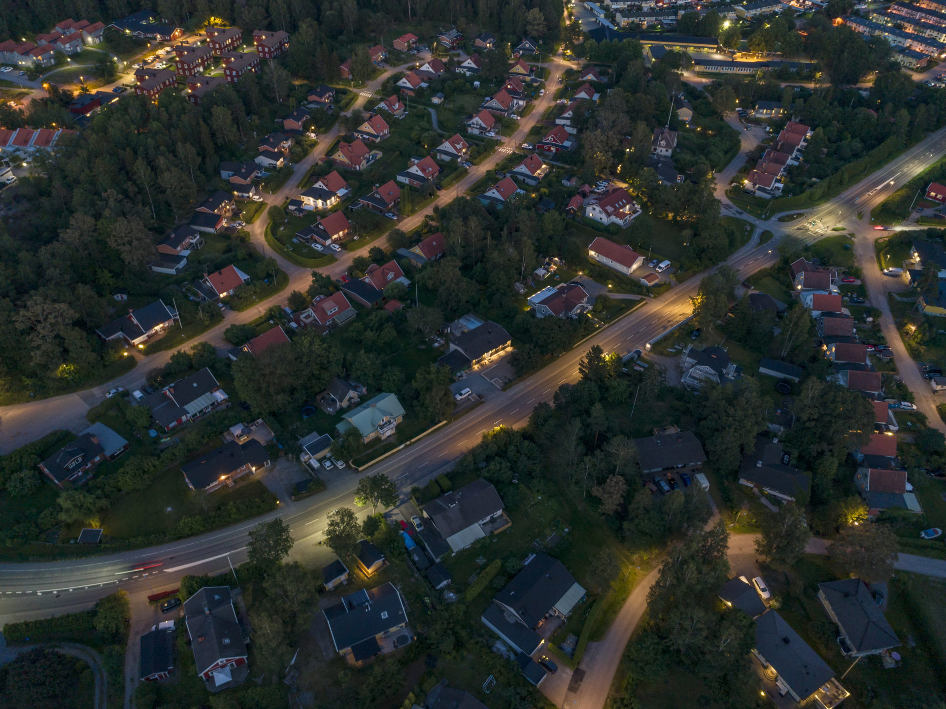 Aerial night view over a small city