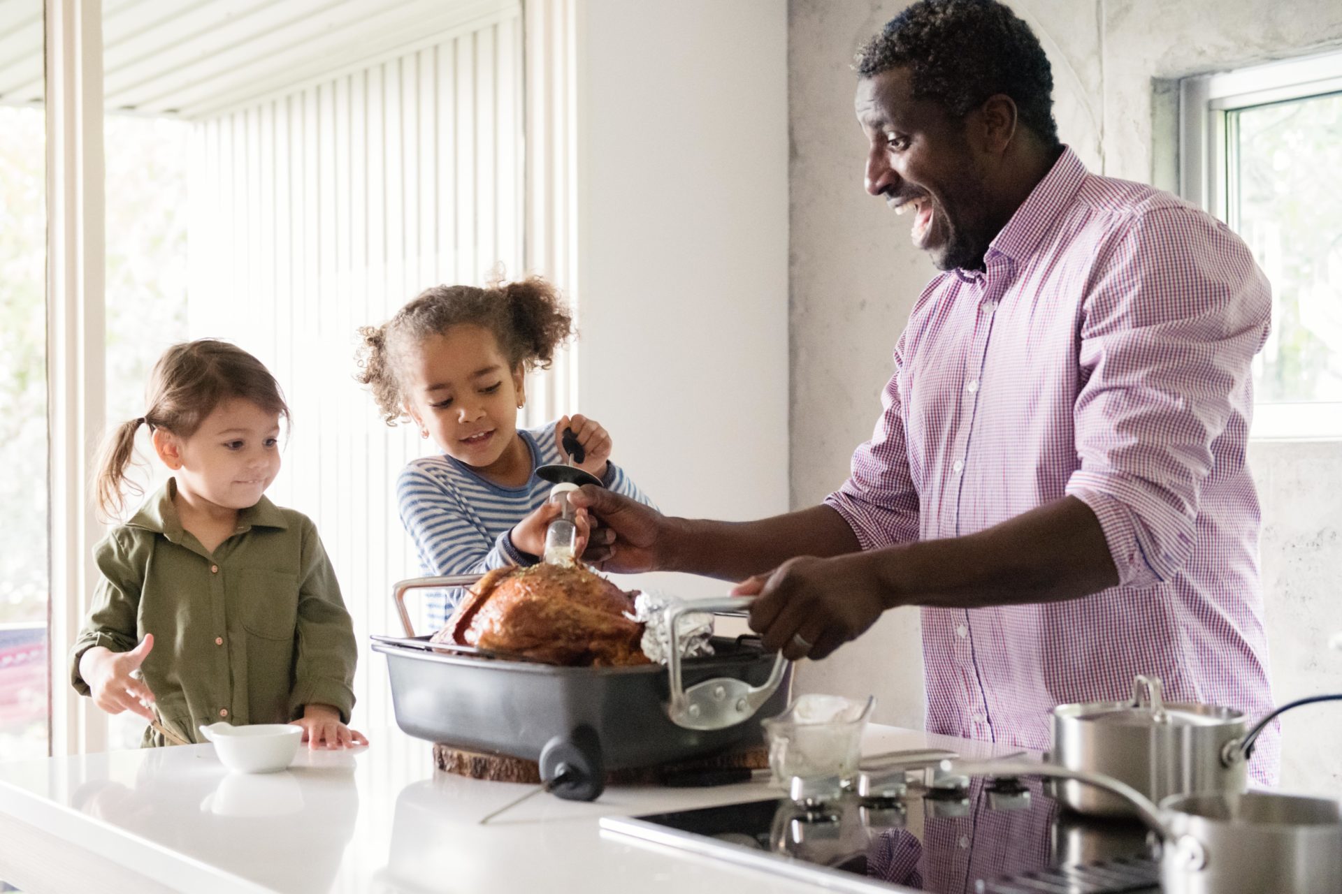 Holiday Season family and friends multi-ethnic during thanksgiving dinner