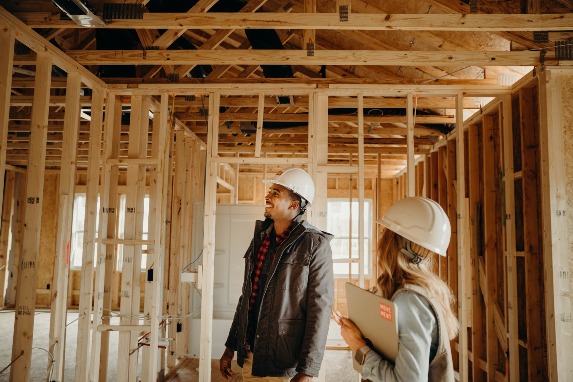 Construction workers inside a new con home