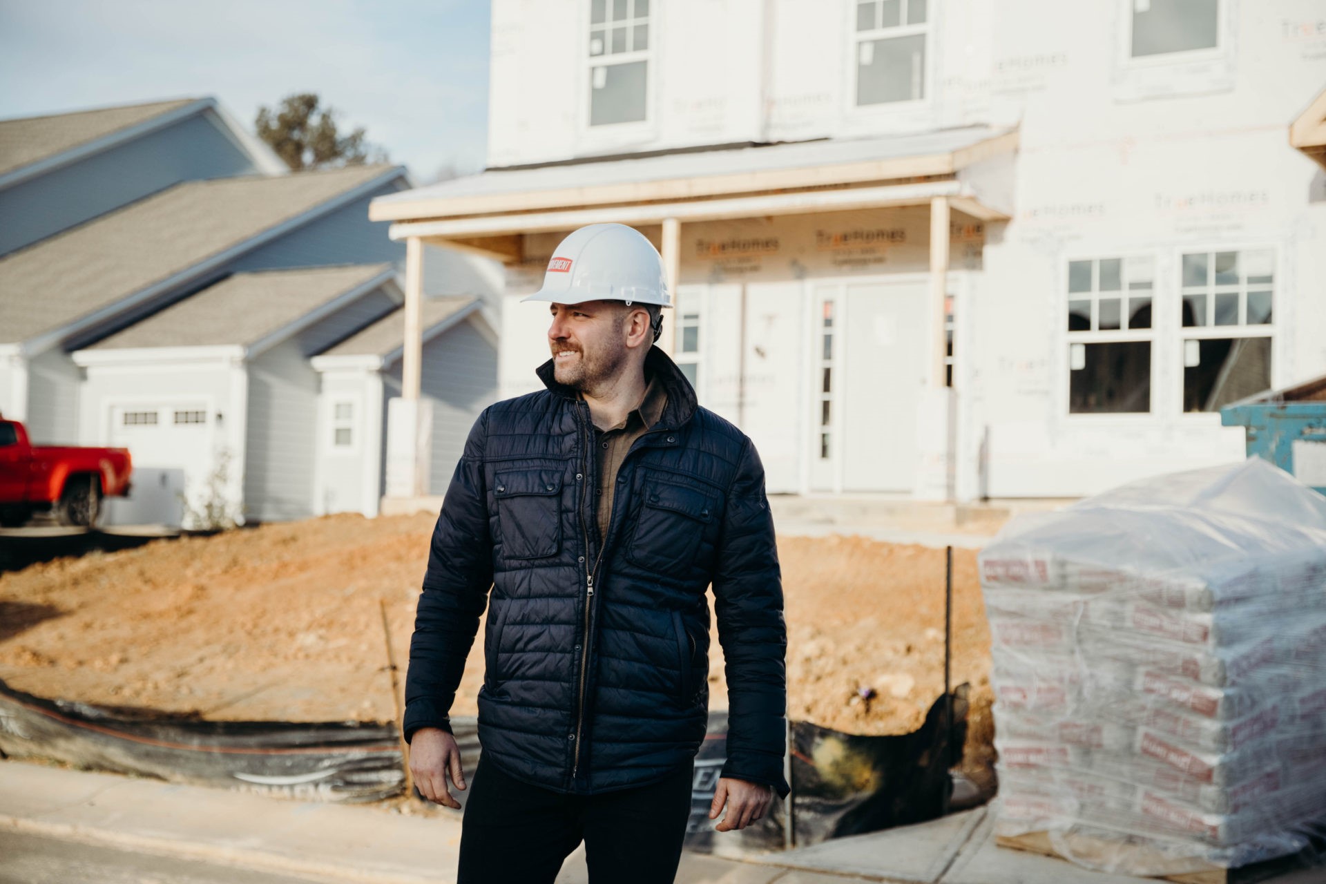 Construction man in white helmet