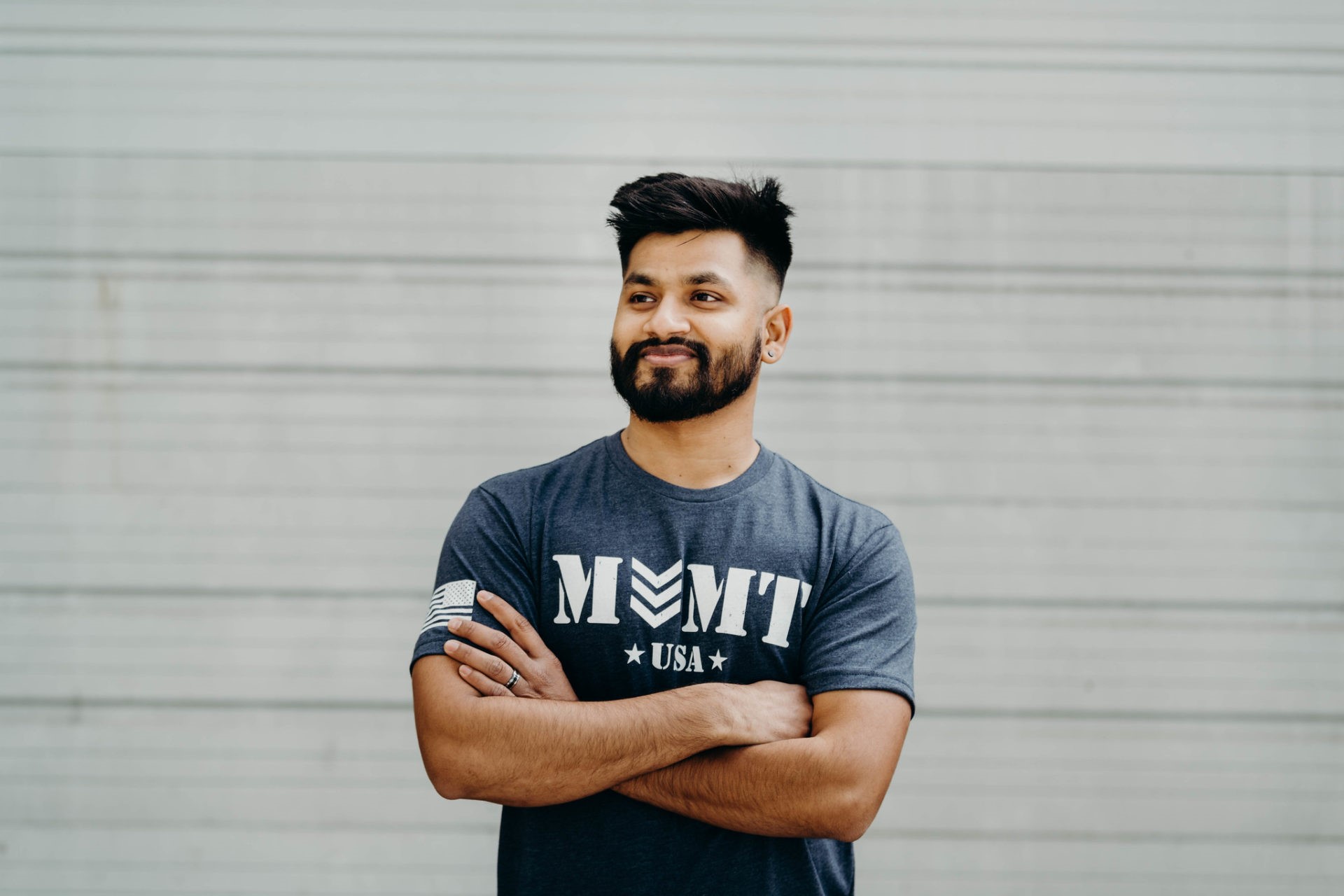 Man modeling blue Movement Military t-shirt