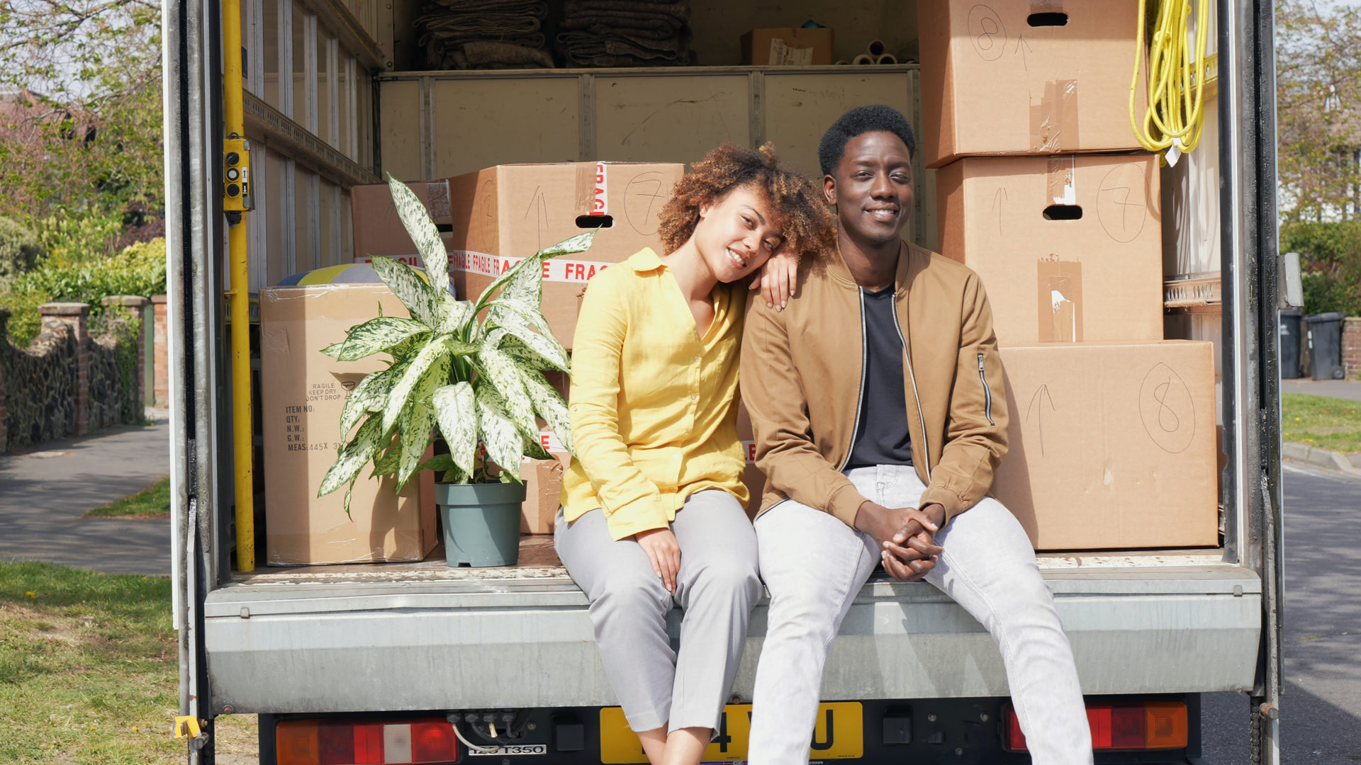 couple sitting in delivery van